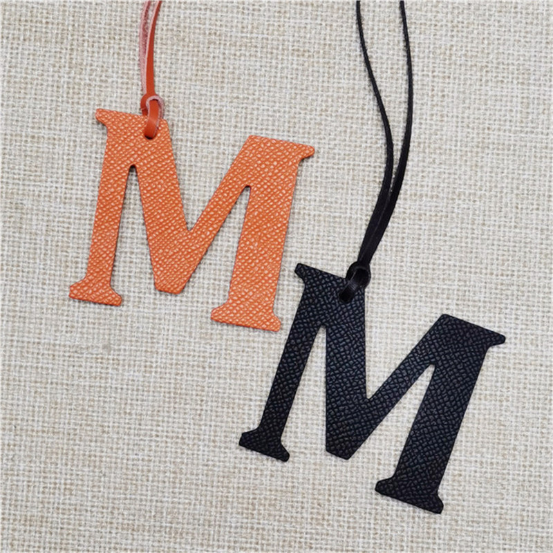 XMESSUN Neuer Englischer Buchs – Monogram Keychain Leather Bewertung und Preis